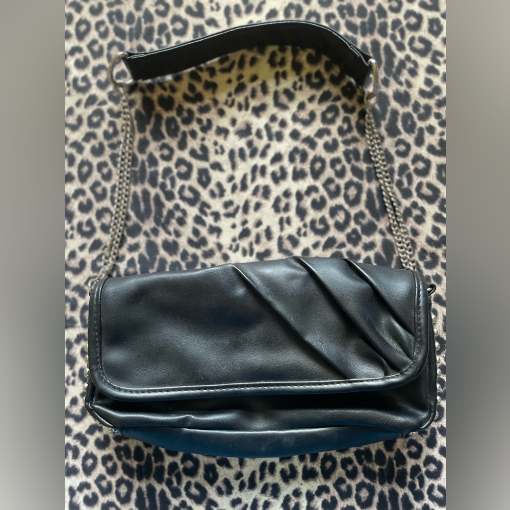 Ladies, small leather like purse with studs and chain handle